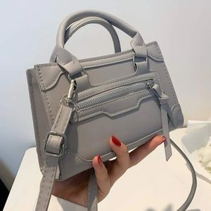 Mini minimalist double handed square bag